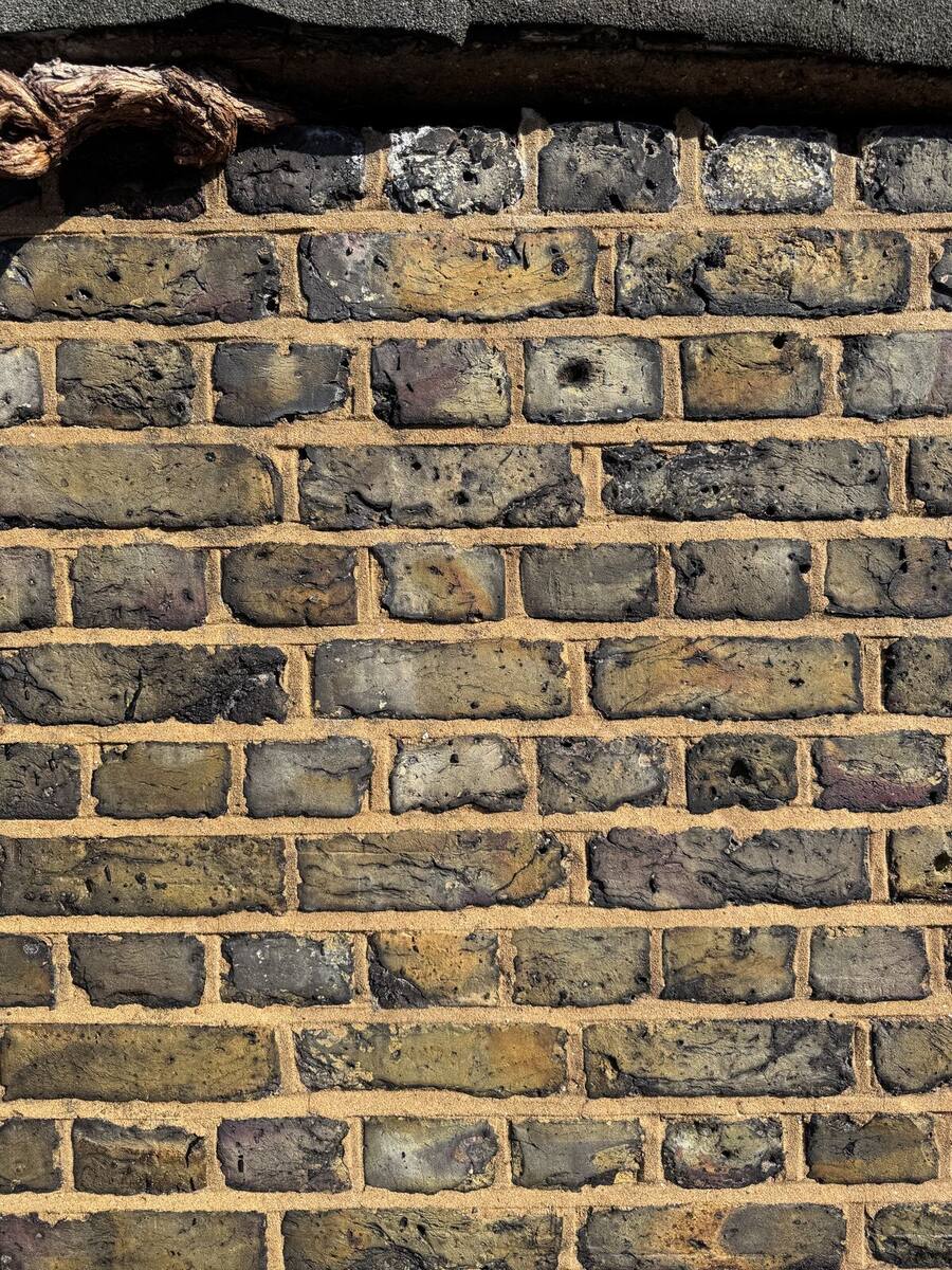 Repointed London stock brick with lime mortar joints after restoration
